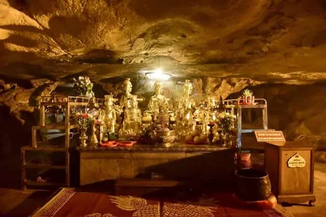 Buddhists and visitors from near and far practice and pay their respects at the ancient Bai Dinh Pagoda