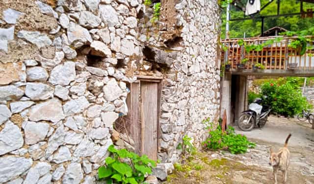 Close-up of stone house wall