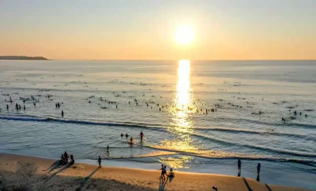 Swimming, watching the sunset on My Khe beach