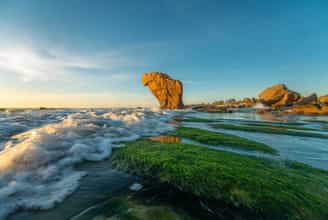 Colorful Pebbles and Mossy Rocks: The Allure of Co Thach Beach